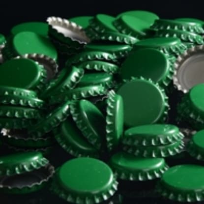 Close-up of green bottle caps.