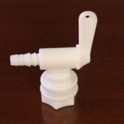 White plastic spigot with lever