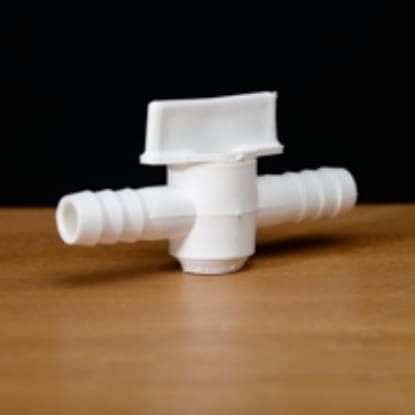 White plastic pipe valve with lever