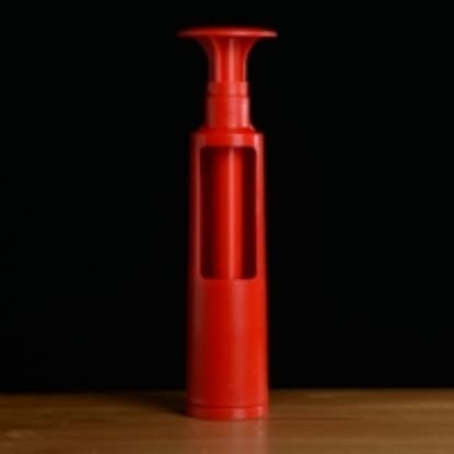 Red plastic wine bottle opener