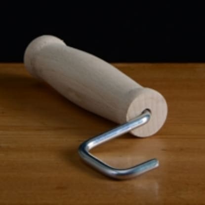 Wooden handle with metal hook.