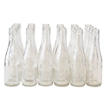 Empty glass bottles on a white background.