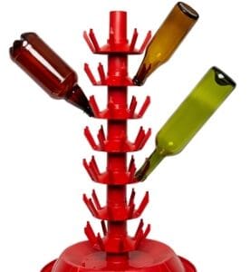 Red bottle drying rack with bottles.