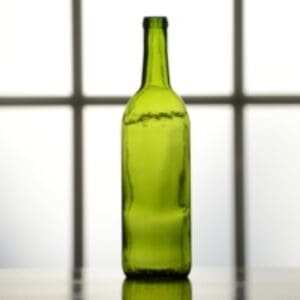 Empty green glass wine bottle.