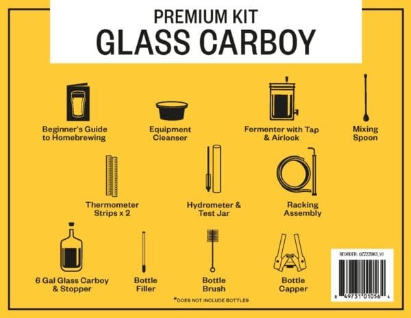 Homebrewing kit with glass carboy and accessories.