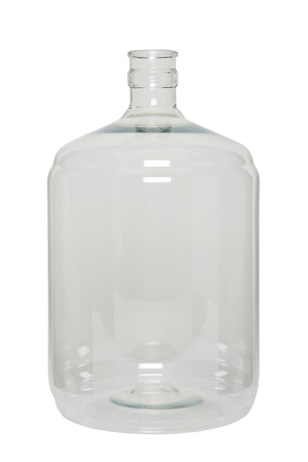 Empty glass water jug with lid.